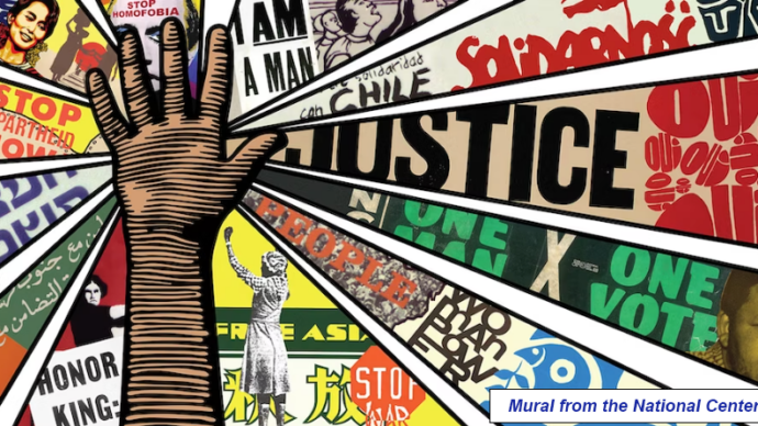 Mural from the National Center for Civil and Human Rights depicting a raised hand surrounded by graphics representing important landmarks and milestones in the civil rights movement.