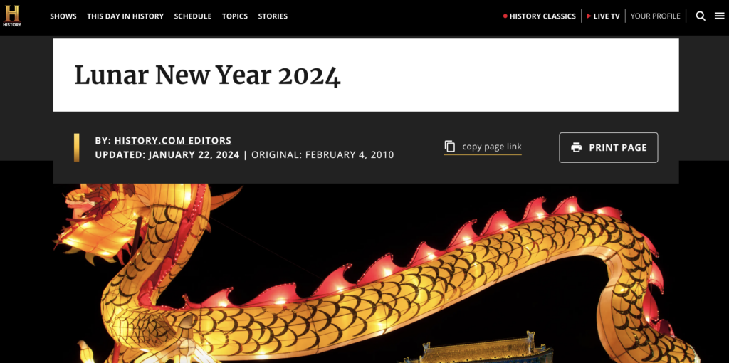History.com Lunar New Year 2024 with photograph of parade float of golden dragon.