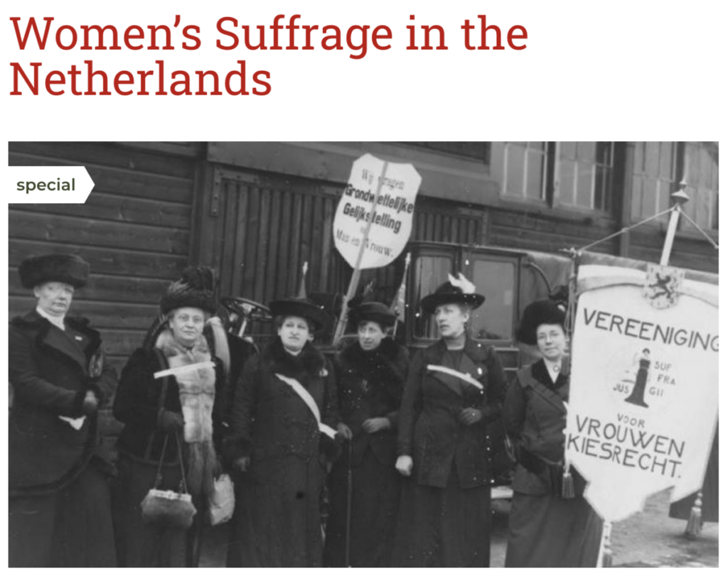 Women's Suffrage in the Netherlands, depicting photo of women with signs.