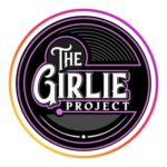 The Girlie Project Logo. Black circle with pink lines and white text: The Girlie Project.