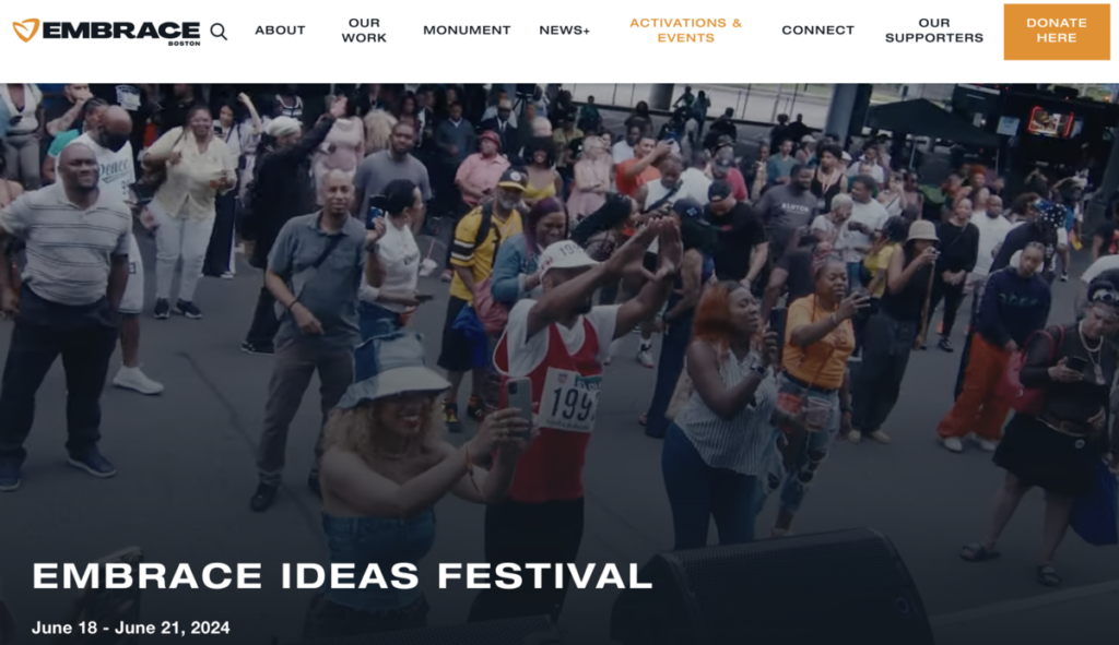 Large gathering of people celebrating the Embrace Ideas Festival in Boston, Massachusetts.