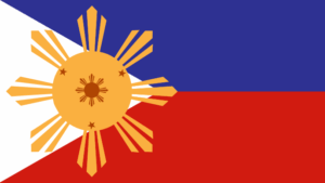 The sun from the Filipino flag in front of blue and red background.