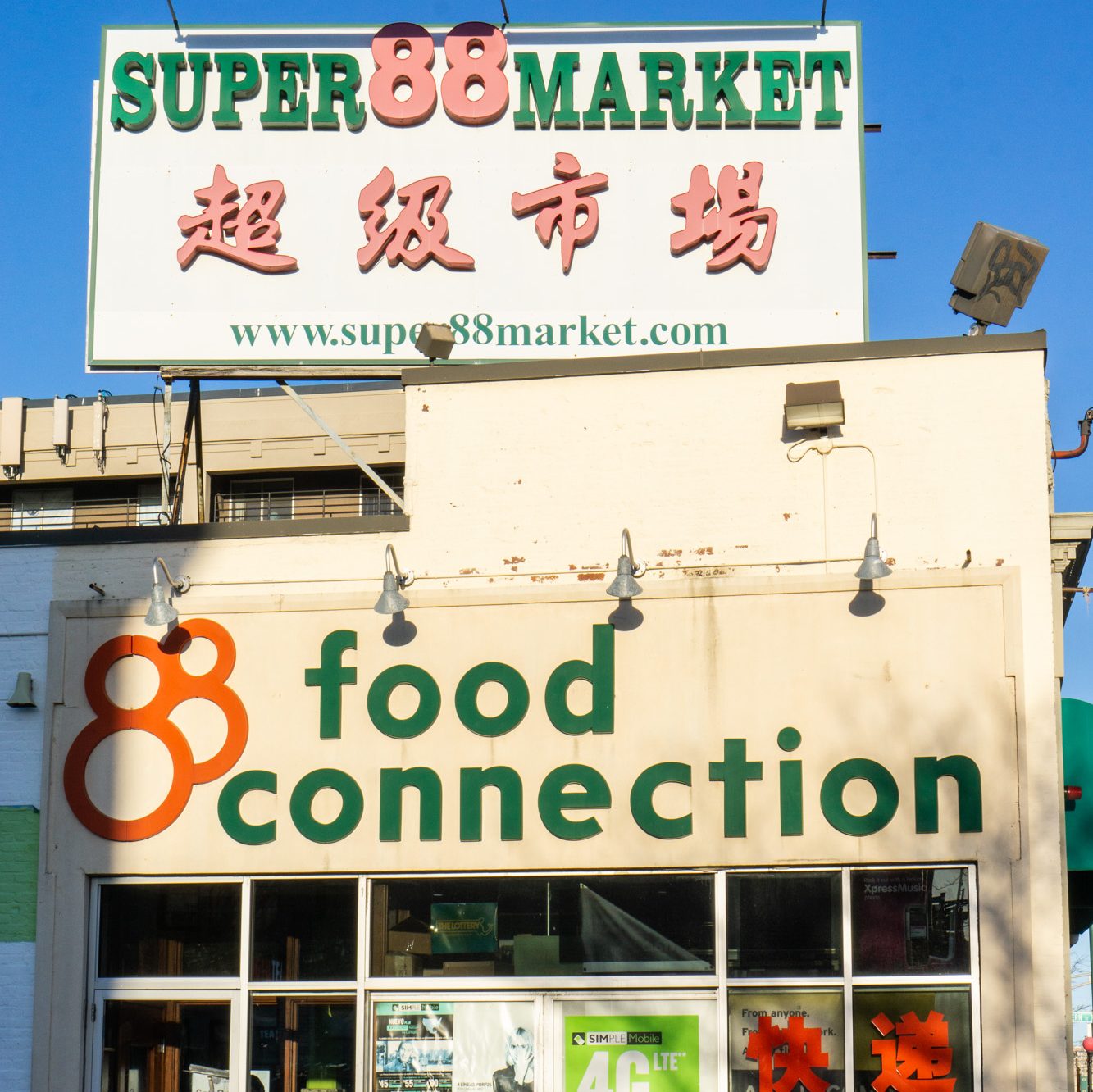 Super 88 Market's entrance, with a billboard that reads "Super 88 Market" and "Food Connection"