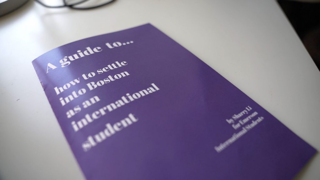 Sharry's zine: a small purple booklet with white serif text that reads: "A guide to... how to settle into Boston as an international student." Created as part of her Media Design coursework.