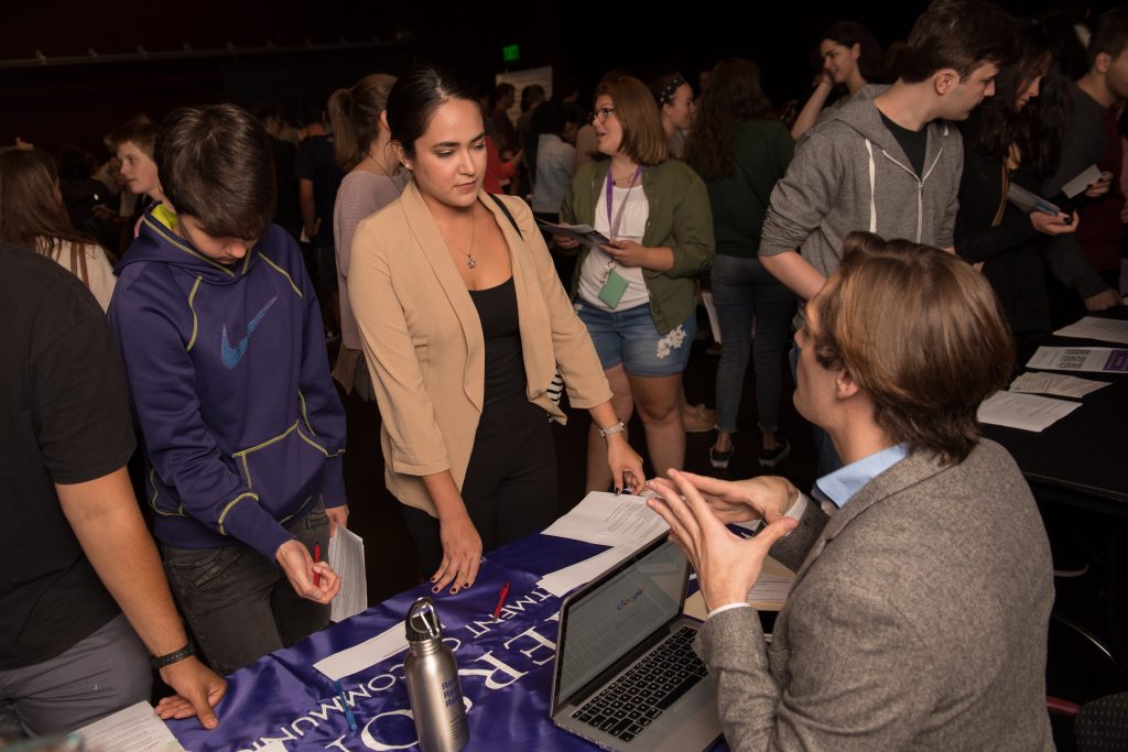 A student talks with an Emerson Admission Staff Member about what Emerson College offers.