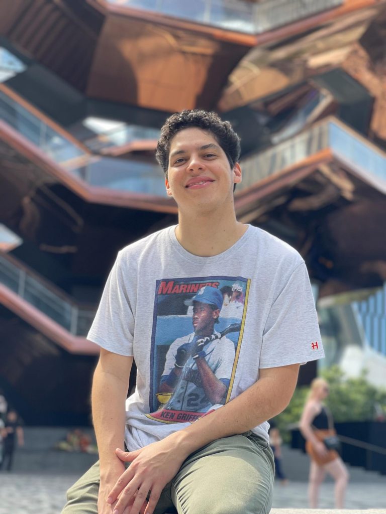 Andrés, smiling, wearing a Ken Griffey Jr. t-shirt