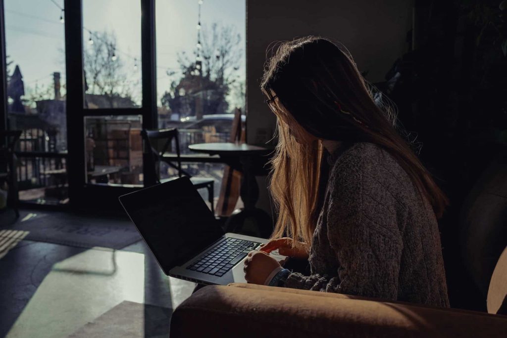 A public relations copywriter working from her living room