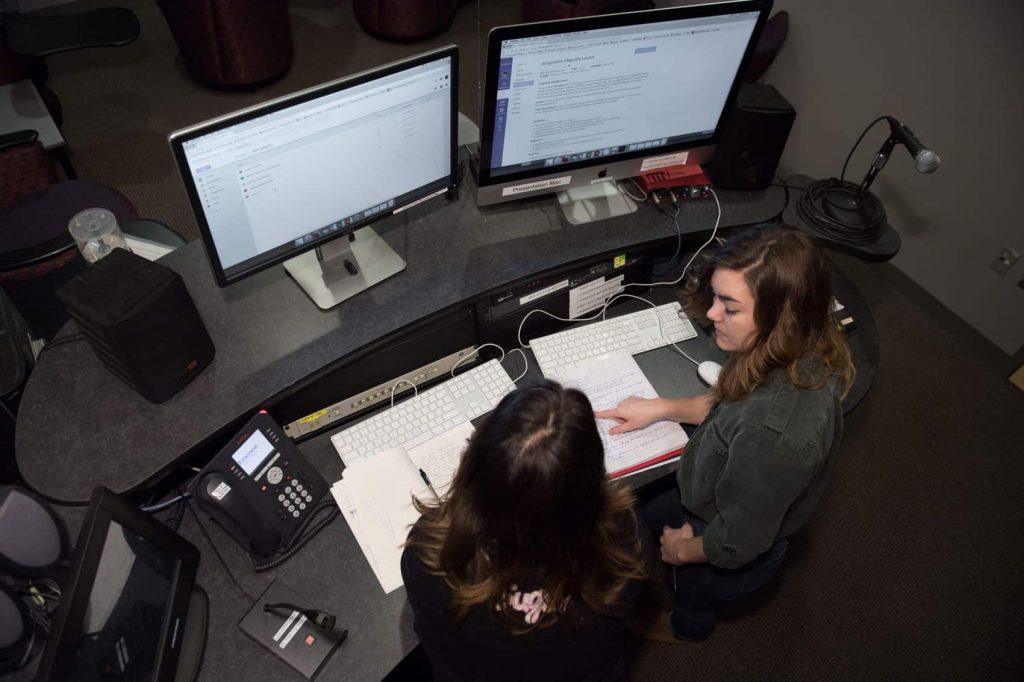 Emerson students studying in the Walker building