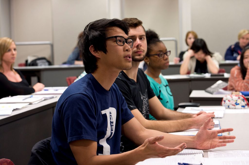 Emerson students engaged in an in-class discussion