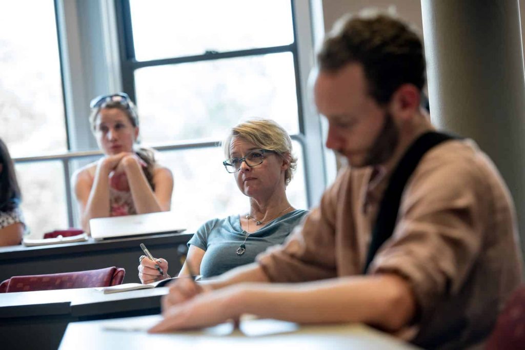 MFA workshop students sitting in an Emerson classroom