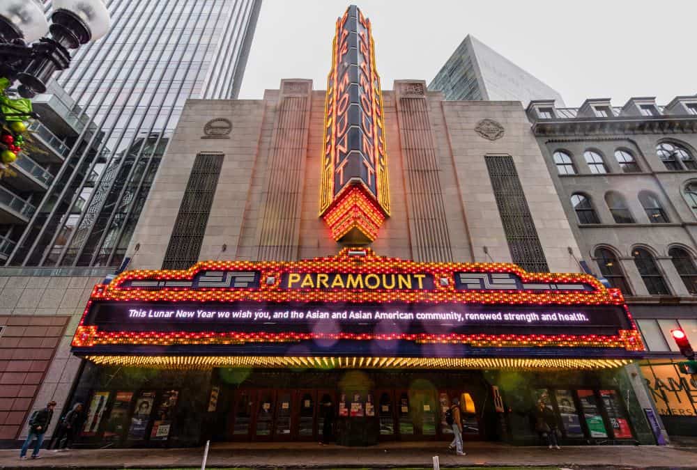 The front of the Paramount Theater in downtown Boston, fully lit