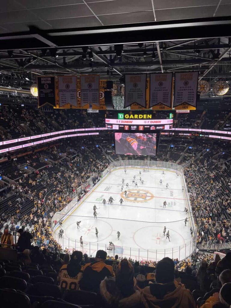 An aerial view of the Bruins playing a game in TD Garden. The stadium is full of excited fans