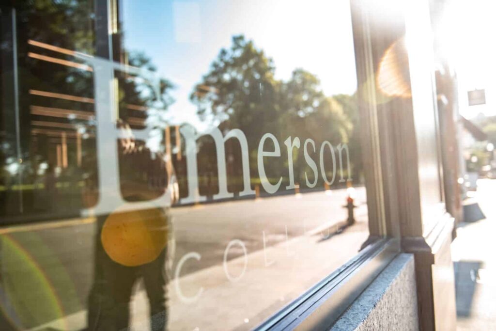 A large window with "Emerson College" etched in white font