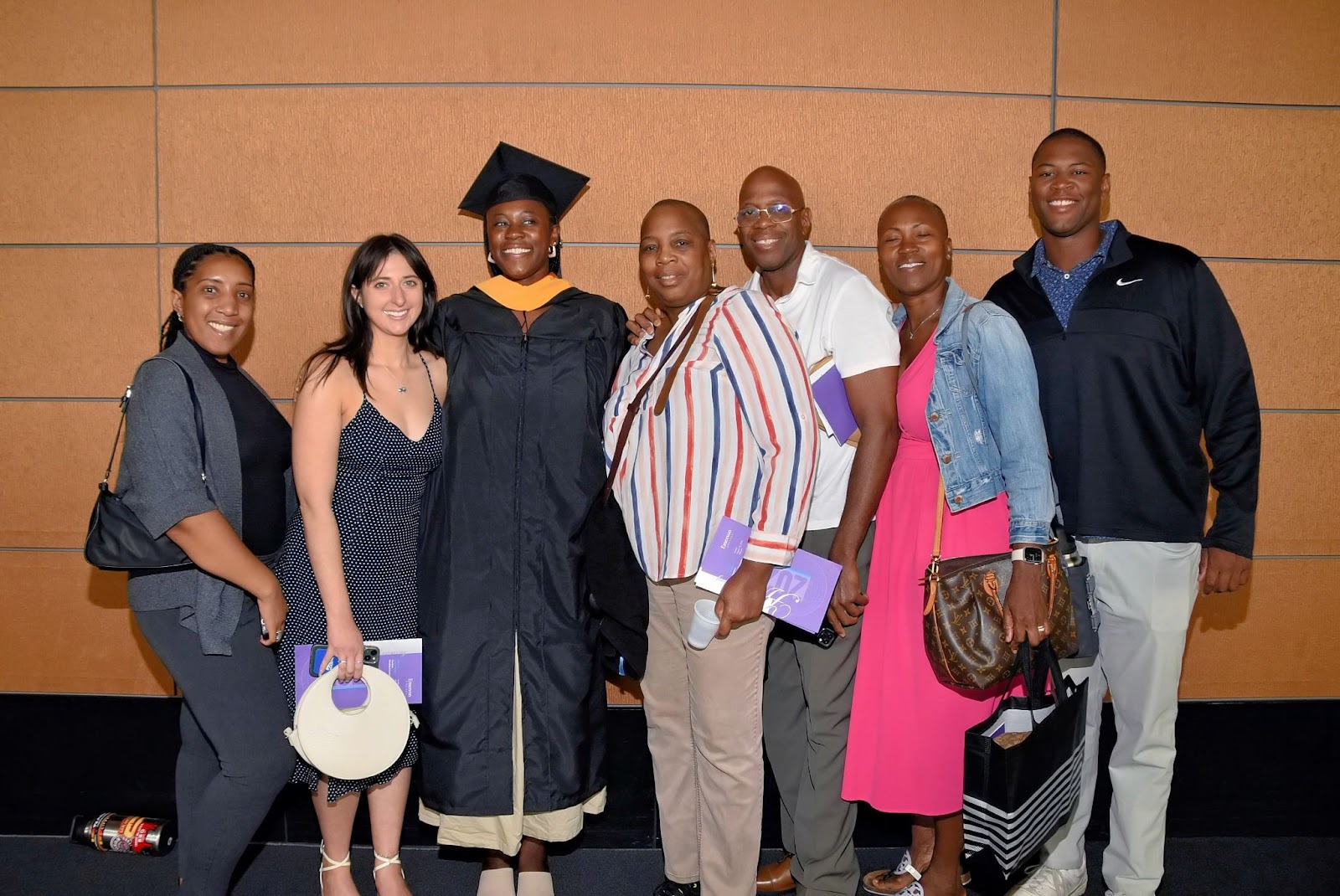 Family and friends come together to celebrate their graduate.