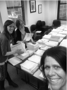 Communication Sciences and Disorders staff collate test packets.