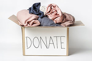 donation box with clothes in it
