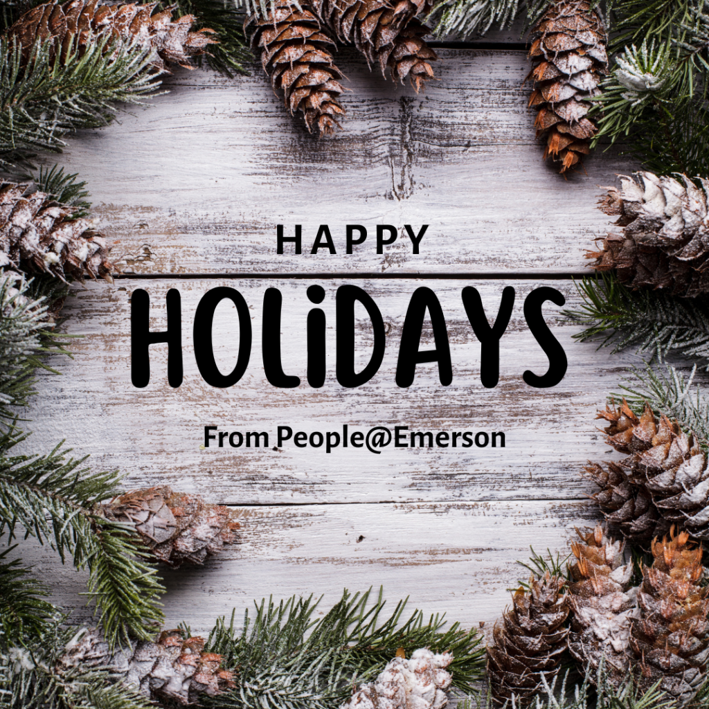 A white wood background with greenery with the message "Happy Holidays from People@Emerson"